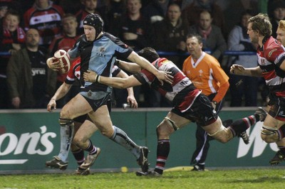 05.02.10 Cardiff RFC v Pontypool RFC - Principality Premiership - Cardiff's Dan Godfrey tries to hand off Pontypool's Cae Trayhern. 