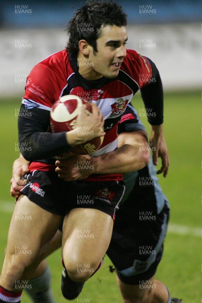 05.02.10 Cardiff RFC v Pontypool RFC - Principality Premiership - Pontypools' Nicky Williams is caught by Cardiff's Darren Chapman. 