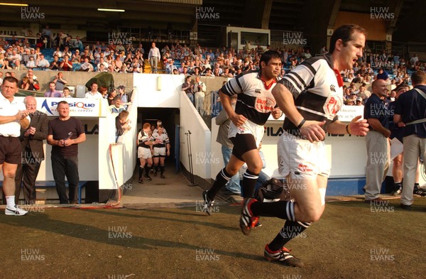 300503 - Cardiff v Pontypridd - Welsh Premiership - Paul John leads Pontypridd out to the Arms Park