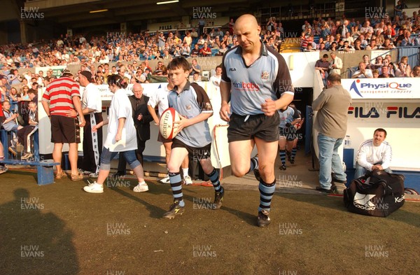 300503 - Cardiff v Pontypridd - Welsh Premiership - Pieter Muller leads Cardiff out onto the Arms Park