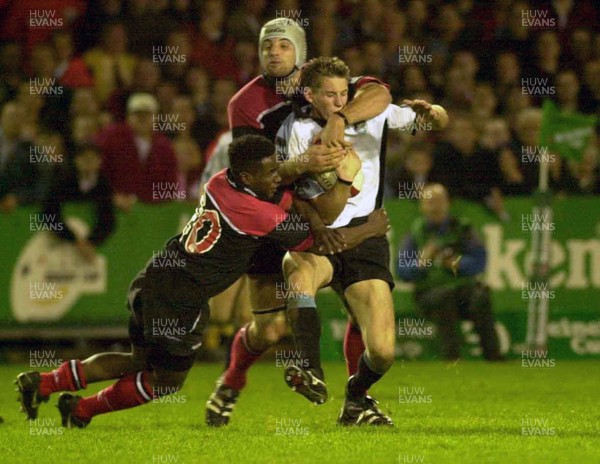 271000 - Cardiff v Saracens -  Cardiff's Jamie Robinson is high tackled by Gerald Arasa and Danny Grewcock who was sin binned for the offence