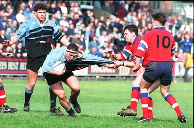 220397 - Cardiff v South Wales Police - Andrew Lewis of Cardiff is collared by Steve Rees and Justin Price