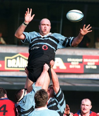 220397 - Cardiff v South Wales Police - Derwyn Jones of Cardiff gets the ball away