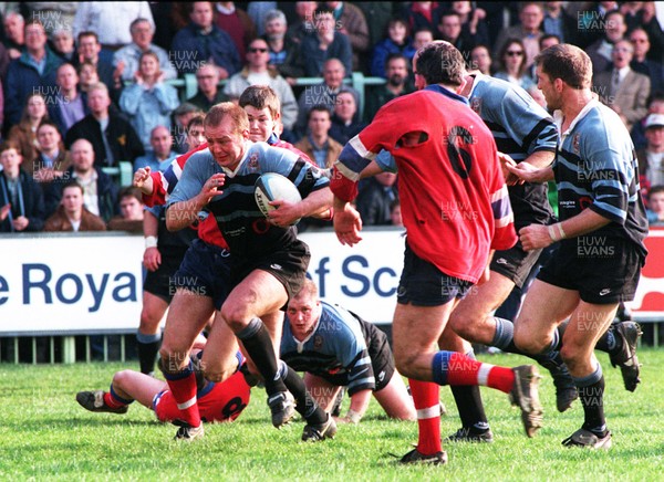 220397 - Cardiff v South Wales Police - Mark Bennett of Cardiff gets past Sean Legge