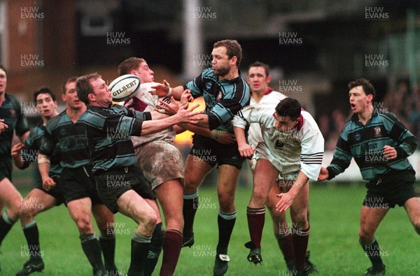 070195 - Cardiff v Swansea - Colin Laity and Mark Bennett of Cardiff battle for the ball with Andy Moore