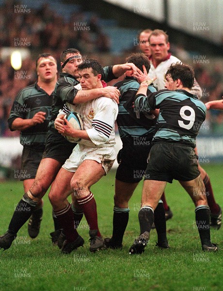 070195 - Cardiff v Swansea - Mike Griffiths of Cardiff tackles Tony Clement of Swansea