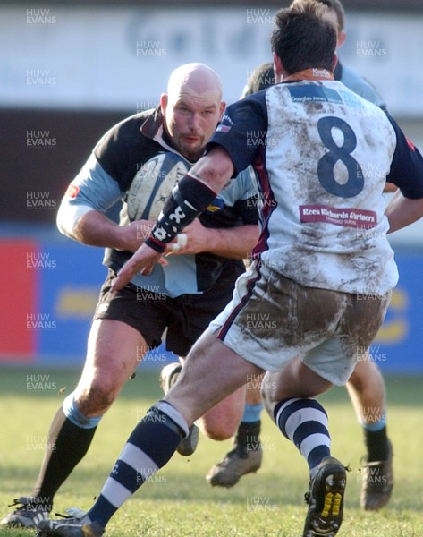 110206 - Cardiff v Swansea - Cardiff's Ben Evans takes on Gareth Newman 