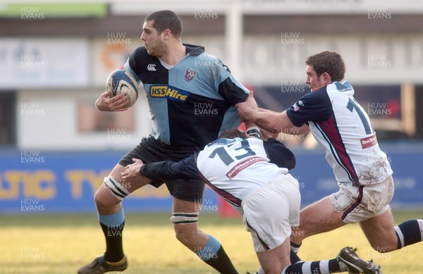 110206 - Cardiff v Swansea - Cardiff's Chris Stamatakis tries to get past Jonny Vaughton and Matthew Brayley 