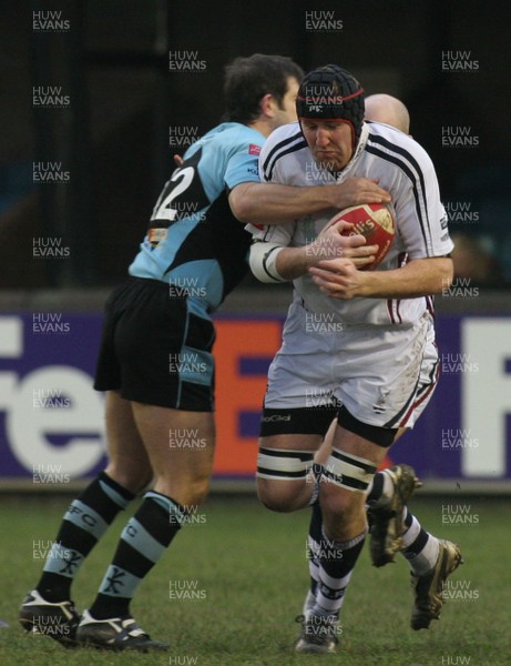 13.01.08 Cardiff RFC vs. Swansea RFC. Principality Premiership, Cardiff.    Gavin Ronan goes on a charge as Tristan Davies puts in the hit.    