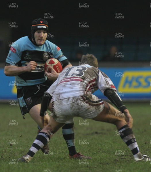 13.01.08 Cardiff RFC vs. Swansea RFC. Principality Premiership, Cardiff.    Roger Davies runs at Adrian Thomas.     