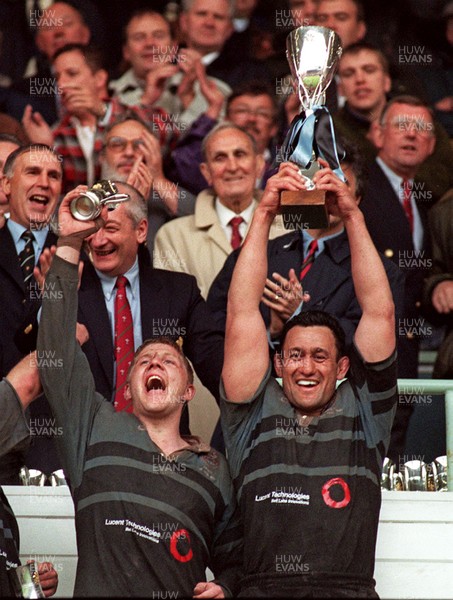 260497 - Cardiff v Swansea - SWALEC Cup Final -  Cardiff captain, Hemi Taylor (rt) and Gwyn Jones celebrate with the trophy