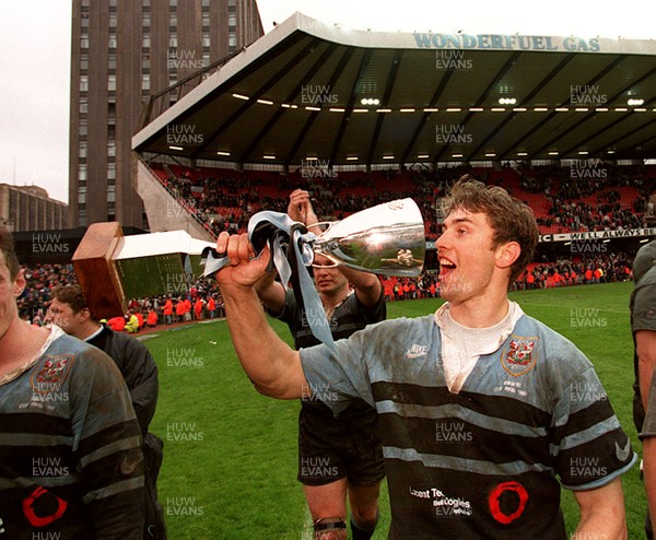 260497 - Cardiff v Swansea - SWALEC Cup Final -  Cardiff's Justin Thomas celebrates with the trophy