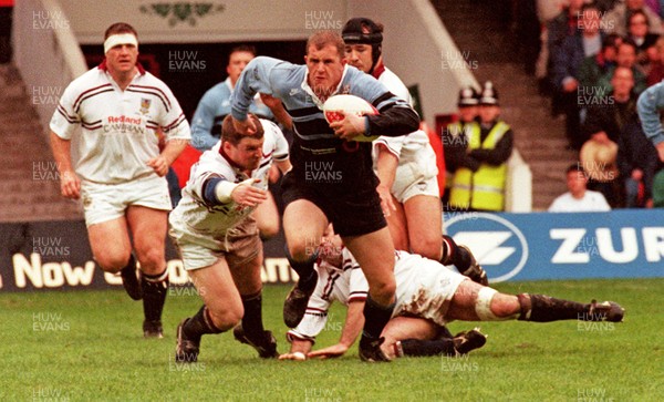 260497 - Cardiff v Swansea - SWALEC Cup Final -  Cardiff's Leigh Davies is tackled by Scott Gibbs