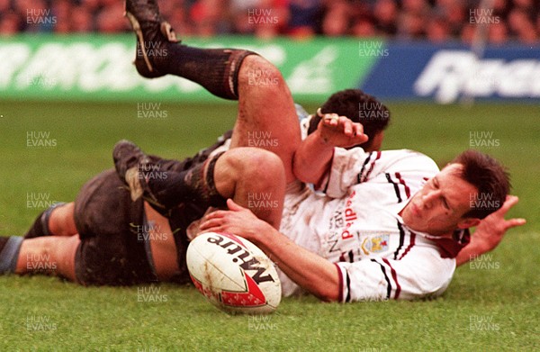 260497 - Cardiff v Swansea - SWALEC Cup Final -  Swansea's Mark Taylor touches down to score try