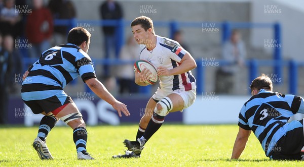 290912 - Cardiff v Swansea - Principality Premiership -Cameron Clement of Swansea looks for a way past Ellis Jenkins of Cardiff