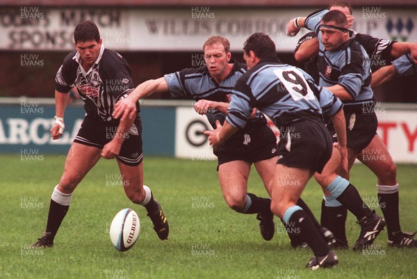 071095 - Cardiff v Treorchy - Vince Davies and Andy Moore of Cardiff chase a loose ball