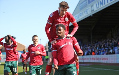 050425 - Carlisle United v Newport County - Sky Bet League 2 - Bobby Kamwa of Newport celebrates scoring his first goal of the match to make it 0-2 with Joe Thomas of Newport on top