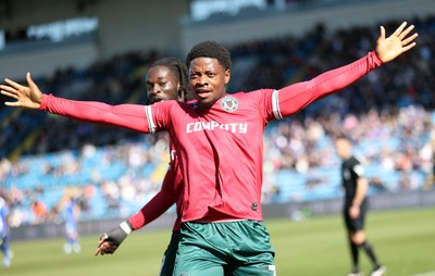 050425 - Carlisle United v Newport County - Sky Bet League 2 - Bobby Kamwa of Newport celebrates scoring his first goal of the match to make it 0-2 with Cameron Antwi of Newport behind