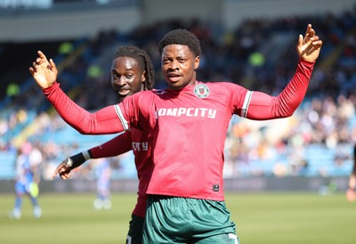 050425 - Carlisle United v Newport County - Sky Bet League 2 - Bobby Kamwa of Newport celebrates scoring his first goal of the match to make it 0-2 with Cameron Antwi of Newport behind