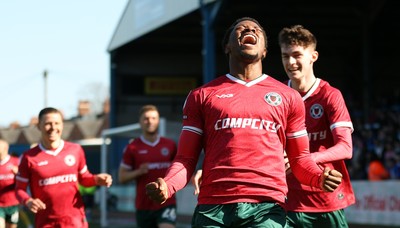 050425 - Carlisle United v Newport County - Sky Bet League 2 - Bobby Kamwa of Newport celebrates scoring his first goal of the match to make it 0-2 with Joe Thomas of Newport