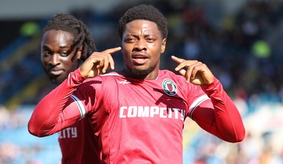 050425 - Carlisle United v Newport County - Sky Bet League 2 - Bobby Kamwa of Newport celebrates scoring his first goal of the match to make it 0-2 with Cameron Antwi of Newport behind