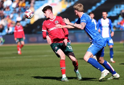 050425 - Carlisle United v Newport County - Sky Bet League 2 - Joe Thomas of Newport and Charlie McArthur of Carlisle
