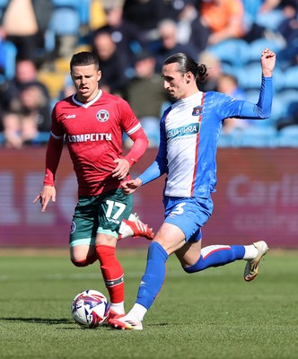 050425 - Carlisle United v Newport County - Sky Bet League 2 - Kieron Evans of Newport and Jude Smith of Carlisle