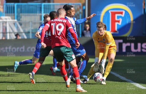 050425 - Carlisle United v Newport County - Sky Bet League 2 - Goalkeeper Gabe Breeze of Carlisle saves from David Ajiboye of Newport
