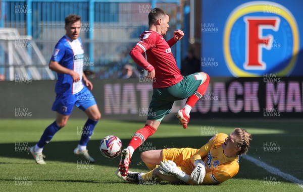050425 - Carlisle United v Newport County - Sky Bet League 2 - Goalkeeper Gabe Breeze of Carlisle saves from Kieron Evans of Newport