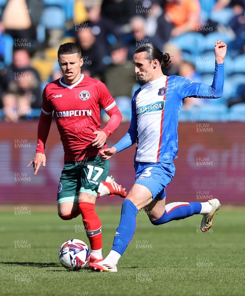 050425 - Carlisle United v Newport County - Sky Bet League 2 - Kieron Evans of Newport and Jude Smith of Carlisle