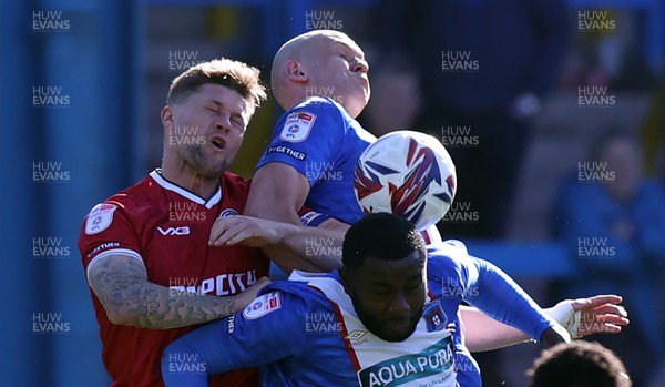 050425 - Carlisle United v Newport County - Sky Bet League 2 - James Clarke of Newport and Georgie Kelly of Carlisle
