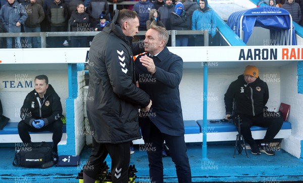 140123 - Carlisle United v Newport County - Sky Bet League 2 - Manager Graham Coughlan of Newport County and Manager Paul Simpson of Carlisle say hello before the start of the match