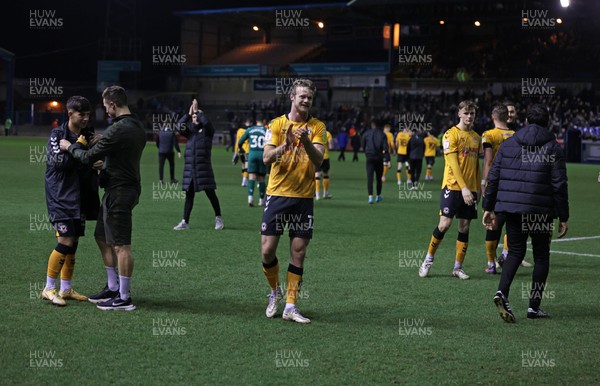150322 - Carlisle United v Newport County - Sky Bet League 2 - Newport County players and staff applaud the fans at the final whistle