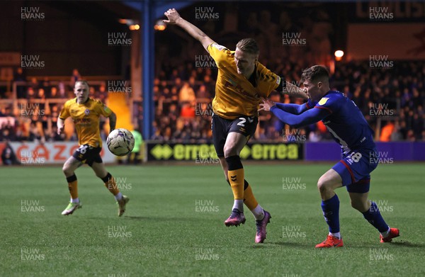 150322 - Carlisle United v Newport County - Sky Bet League 2 - Mitchell Roberts of Carlisle United and Cameron Norman of Newport County