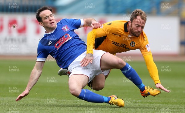 290417 - Carlisle United v Newport County - SkyBet League Two - Luke Joyce of Carlisle and Sean Rigg of Newport County collide