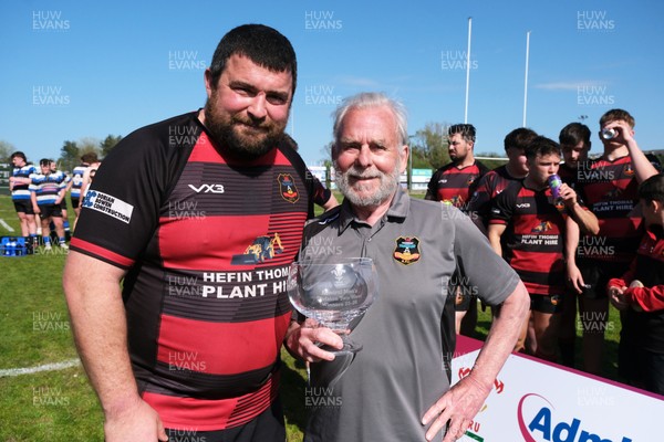 250426 - Fishguard v Carmarthen Athletic - Admiral National League 2 West - Carmarthen Athletic captain Richard Davies and Carmarthen Athletic President Dr Chris John with the league trophy