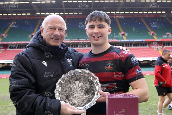 290324 - Carmarthen Athletic v Bargoed - WRU Boys U18 Plate Final - Athletic Captain Lewys Thomas receives the trophy from Terry Cobner of the WRU