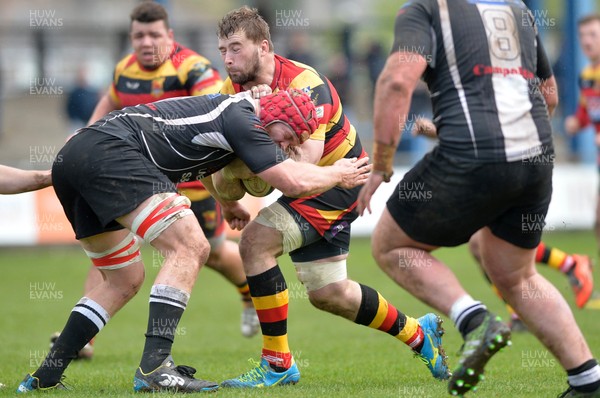 010417 Carmarthen Quins v Bedwas - Fosters Challenge Cup Final Morgan Allen of Carmarthen Quins takes on Joe Davies of Bedwas