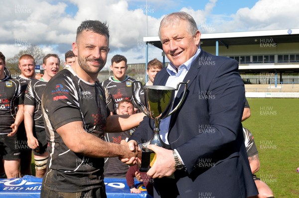 010417 Carmarthen Quins v Bedwas - Fosters Challenge Cup Final - Anthony Buchanan presents Nicky Griffiths Captain of Bedwas with the fosters cup! 