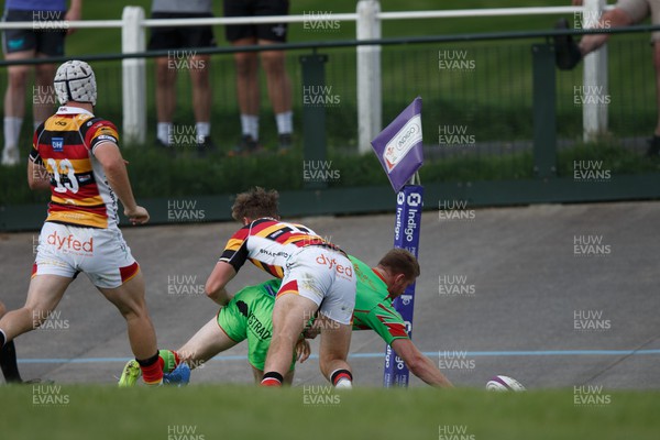 020923 - Carmarthen Quins v Llandovery - Indigo Group Premiership - Aaron Warren of Llandovery reaches out but loses the ball over the try line