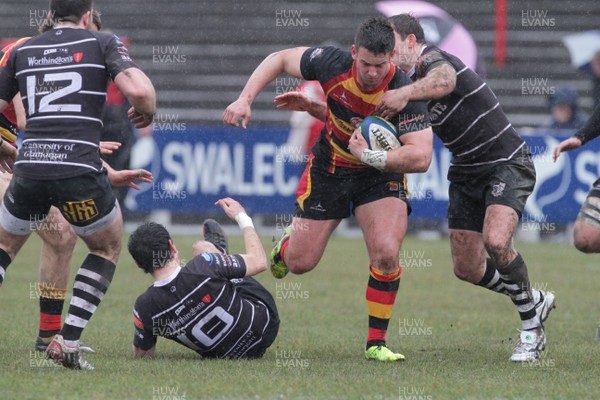 130413 - Camarthen Quins v Pontypridd - Swalec Cup Semi Final - Carmarthen Quins Rheon James attempts to break the Pontypridd defence