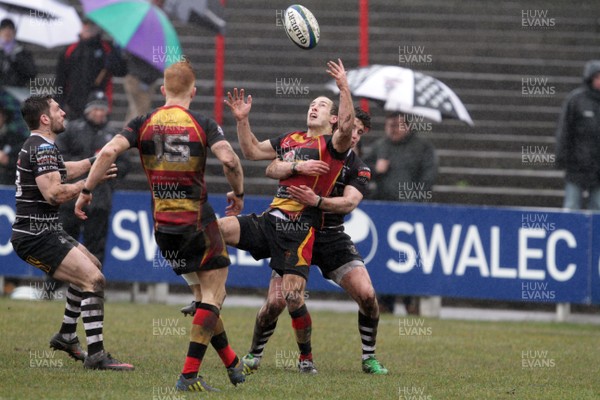 130413 - Camarthen Quins v Pontypridd - Swalec Cup Semi Final - Carmarthen Quins Lee Williams challenges for the ball