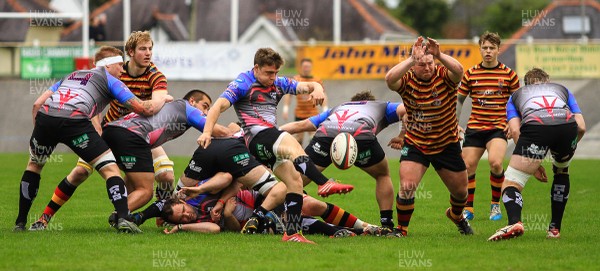 250415 - Carmarthen Quins v Pontypridd - Principality Premiership - Pontypridd scrum half Joel Raikes clears his lines