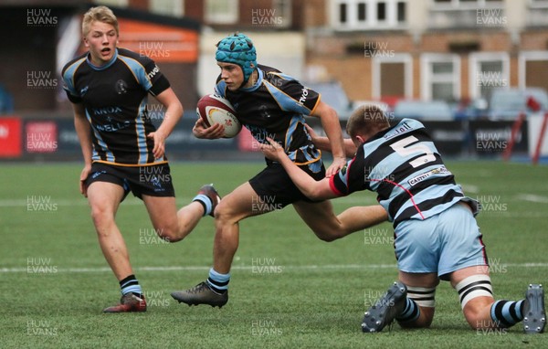 061217 - Cardiff and Vale College v Whitchurch High School, WRU Schools and Colleges League - Ollie James of Whitchurch takes on Cameron Roy of CAVC as he weaves his way through the CAVC defence to score try