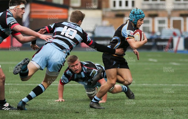 061217 - Cardiff and Vale College v Whitchurch High School, WRU Schools and Colleges League - Ollie James of Whitchurch weaves his way through the CAVC defence to score try