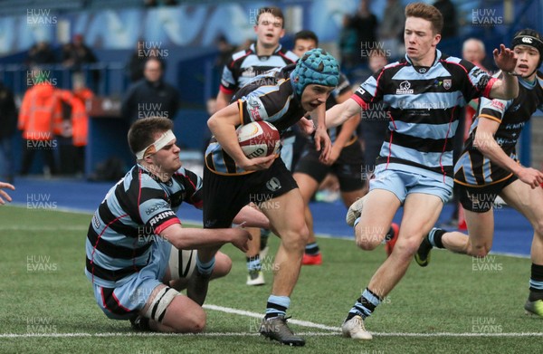 061217 - Cardiff and Vale College v Whitchurch High School, WRU Schools and Colleges League - Ollie James of Whitchurch weaves his way through the CAVC defence to score try