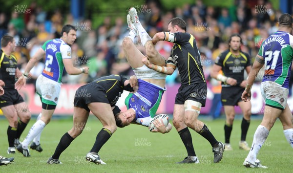 26.04.09 - Celtic Crusaders v Castleford Tigers - engage Super League - Tigers Richard Owen is tackled by the Crusaders defence. 