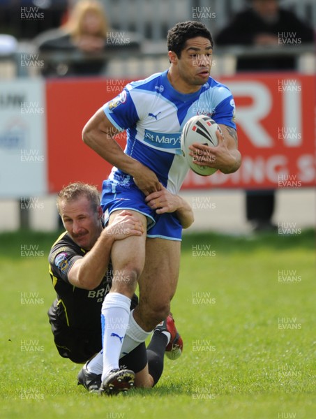 13.04.09 - Celtic Crusaders v Harlequins - engage Super League - Harlequins Will Sharp is tackled by Damien Quinn. 