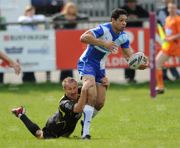 13.04.09 - Celtic Crusaders v Harlequins - engage Super League - Harlequins Will Sharp is tackled by Damien Quinn. 