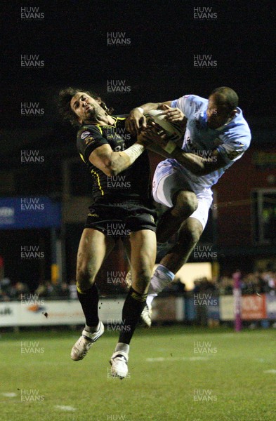 21.02.09 - Celtic Crusaders v Hull FC, engage Super League. - Crusaders Mark Dalle Cort  and Hull's Mark Calderwood look claim the high ball 